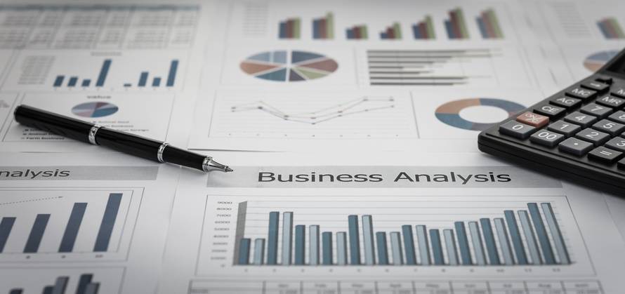 Business,Graphs,And,Charts,Report,With,Pen,,Calculator,On,Desk