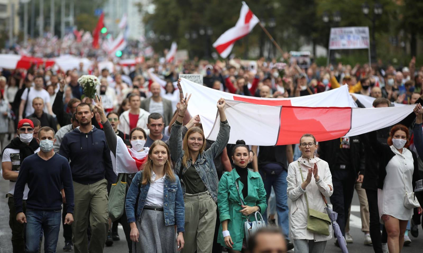 People attend an opposition rally to reject the presidential election results in Minsk