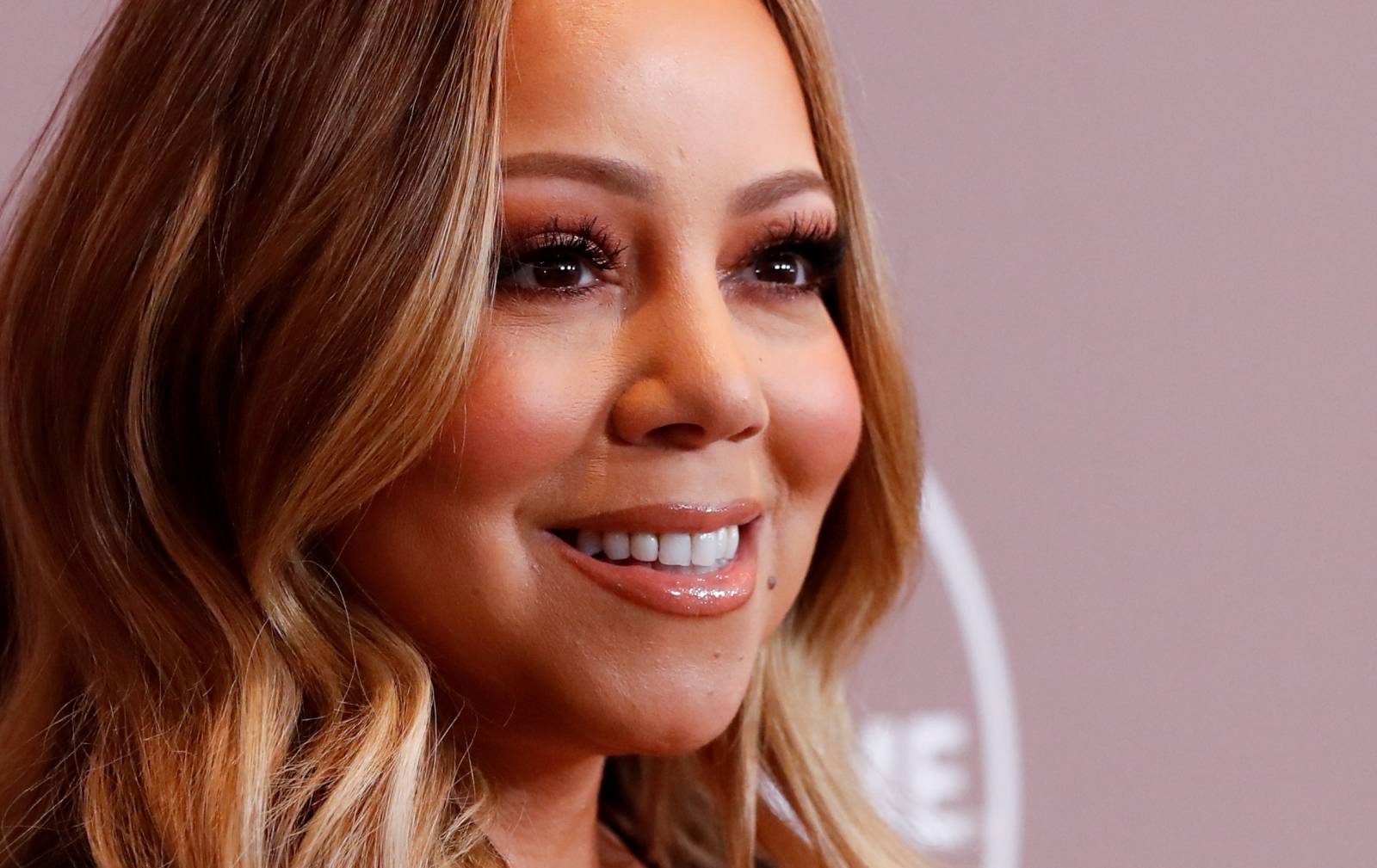 FILE PHOTO: Mariah Carey's brother files lawsuit over memoir