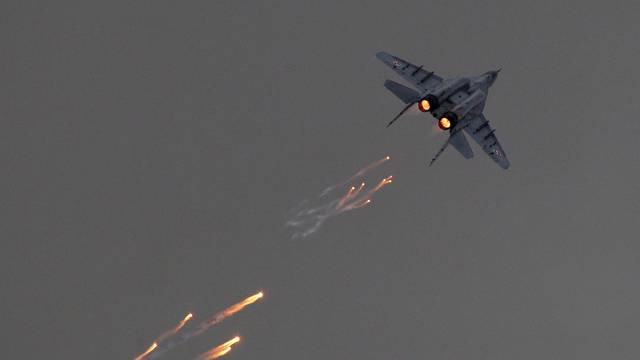 FILE PHOTO: A Polish Air Force MiG-29 aircraft fires flares during a performance at the Radom Air Show at an airport in Radom