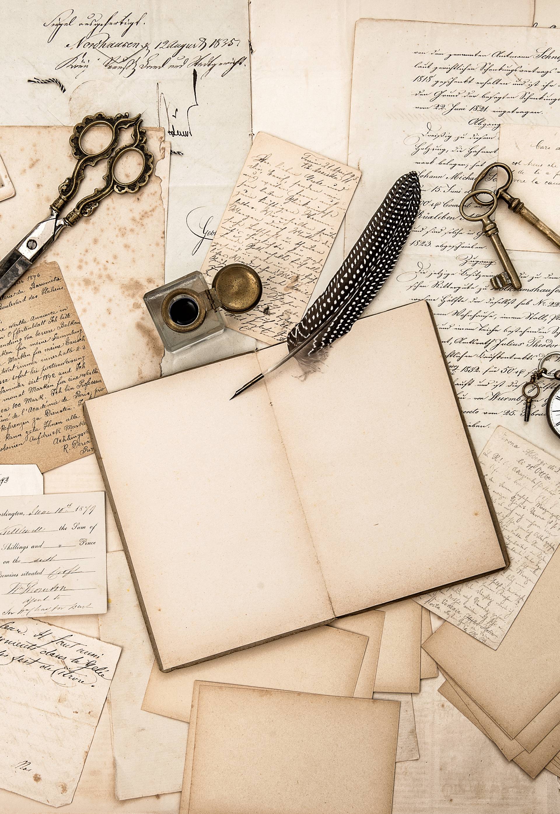 Old handwritten letters, pictures and antique writing accessories