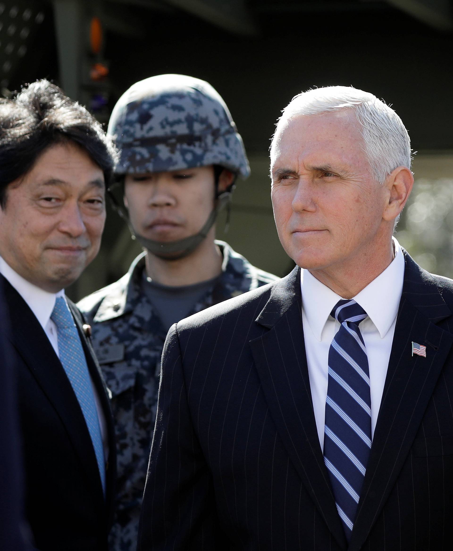 U.S. Vice President Mike Pence leaves after inspecting the Patriot Advanced Capability-3 (PAC-3) missile launch system with Itsunori Onodera, Japan's defense minister, during a demonstration at the Ministry of Defense in Tokyo