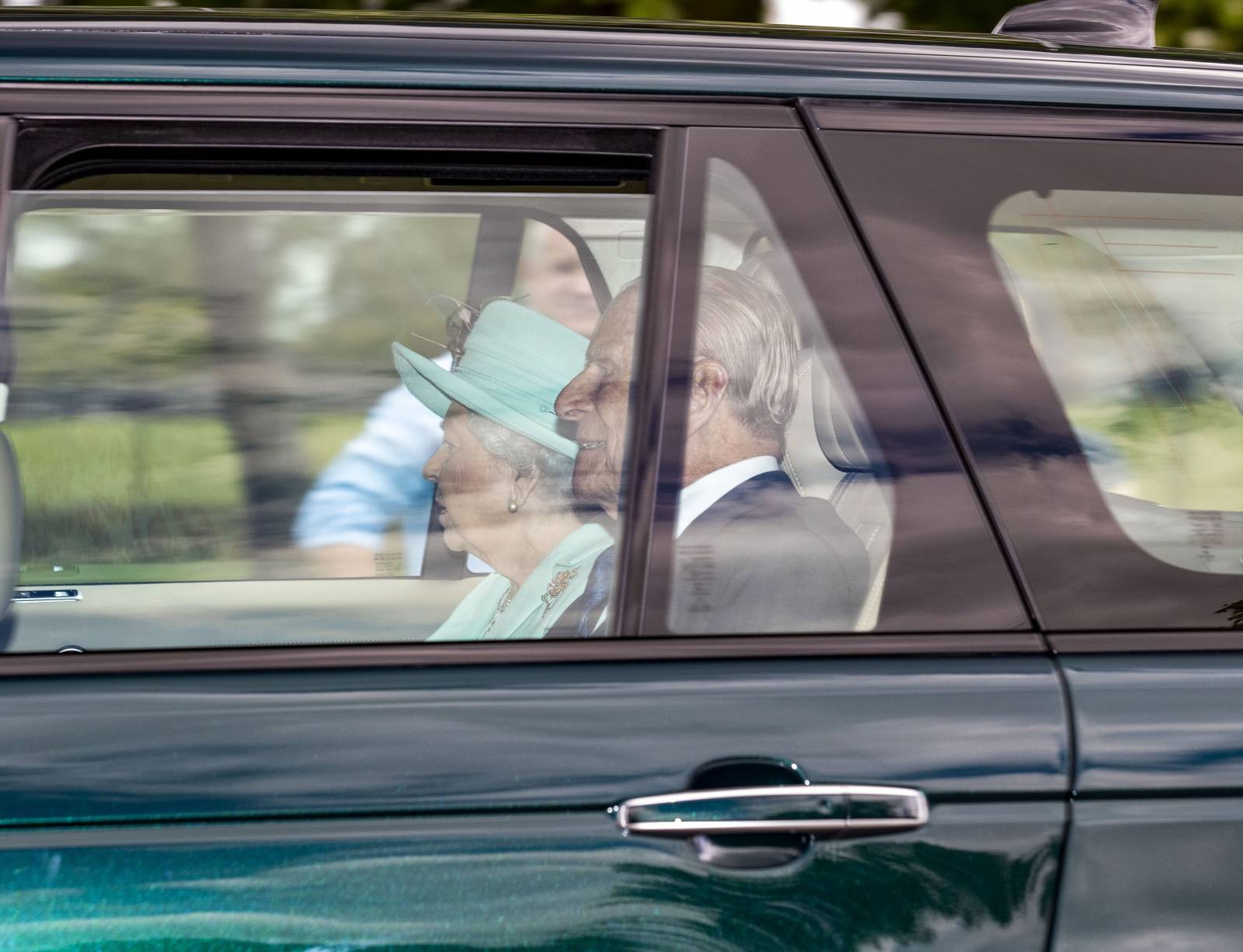 HRH Queen Elizabeth and Prince Philip are seen being driven out of the Royal Lodge, Windsor, after the secret wedding ceremony of Princess Beatrice and Edoardo Mozzi on Friday 17 July 2020.