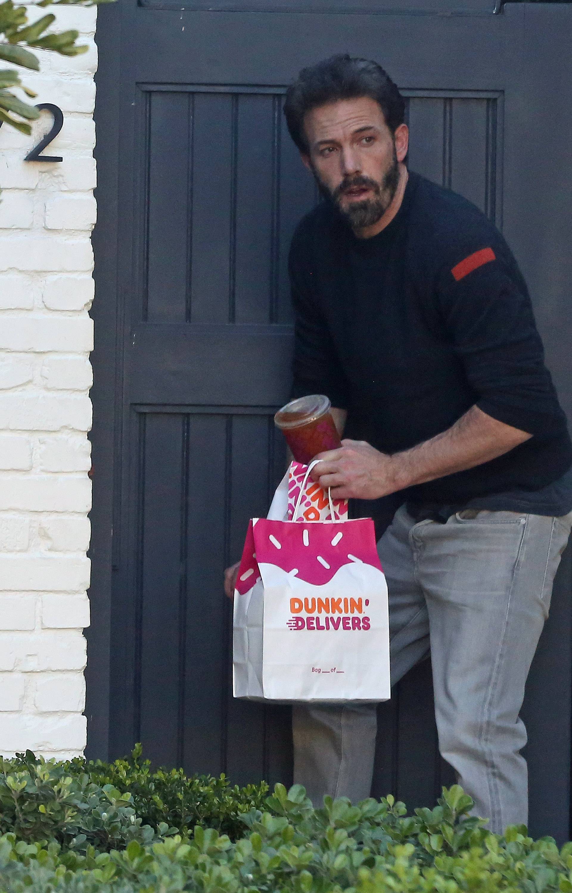 EXCLUSIVE: Ben Affleck picks up Dunkin Donuts from his doorstep