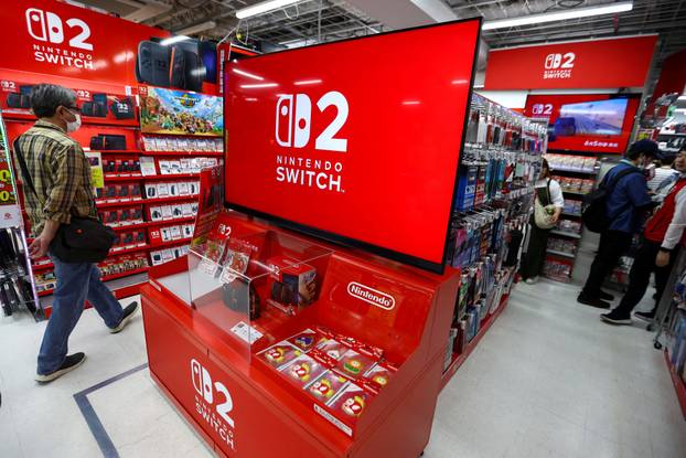 Nintendo Switch 2 gaming device is displayed as Nintendo starts selling the new consoles globally, at an electronics store in Tokyo