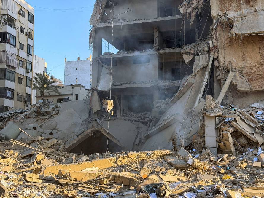 A view of a damaged building after an Israeli strike, following renewed hostilities between Hezbollah and Israel amid the U.S.-Israeli conflict with Iran
