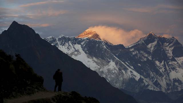 Light illuminates Mount Everest during sunset in Solukhumbu district also known as the Everest region