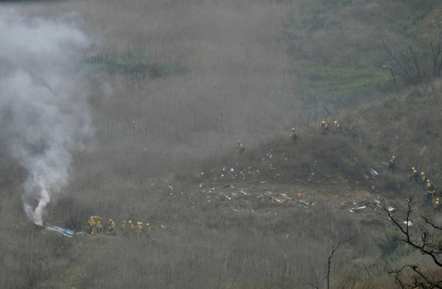 LA county firefighters on the scene of a helicopter crash that reportedly killed Kobe Bryant in Calabasas