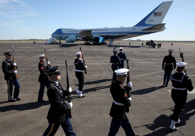 A military honor guard takes part in a departure ceremony honoring former President George H.W. Bush at Ellington Field Joint Reserve Base in Houston