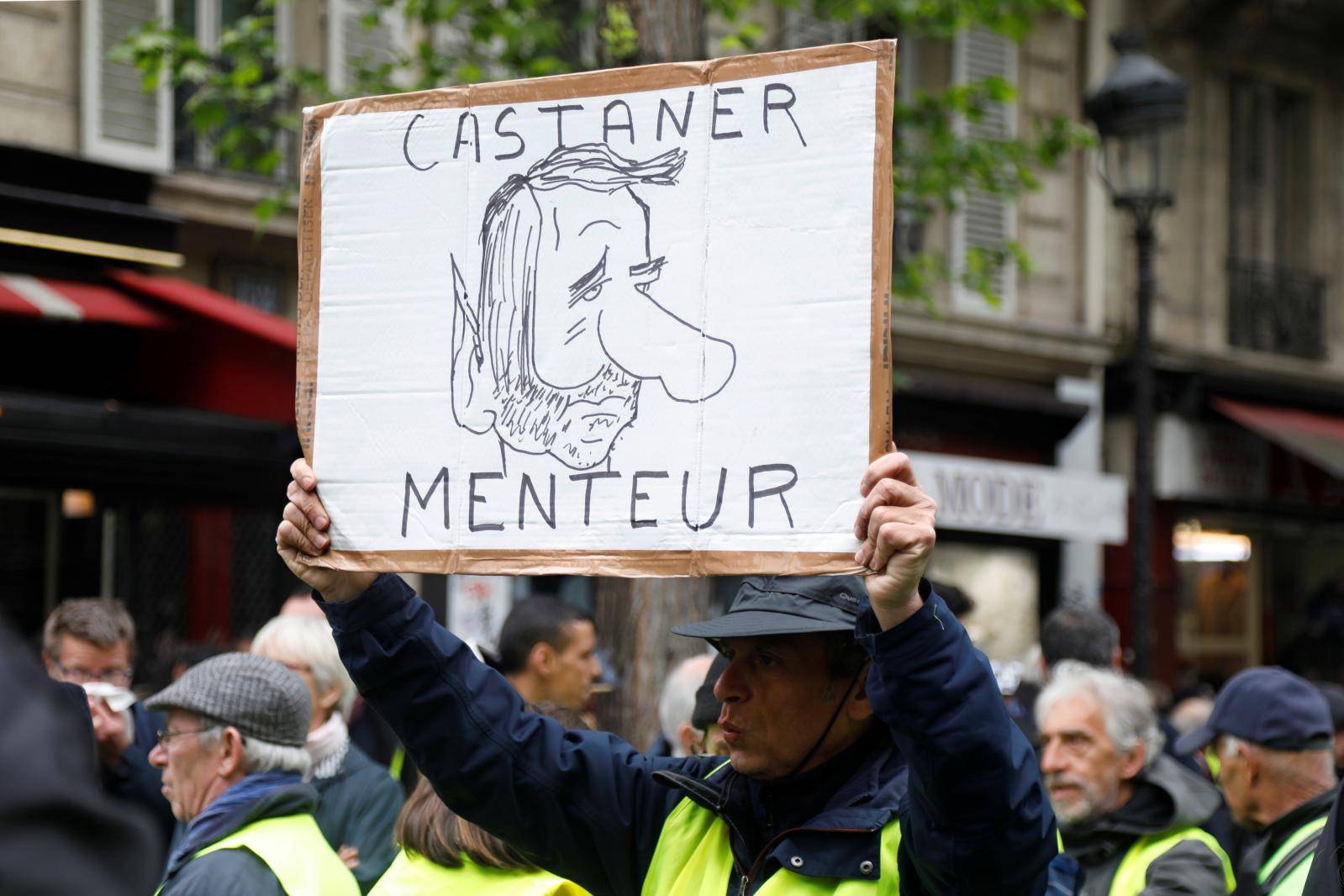 Protesters wearing yellow vests attend a demonstration in Paris