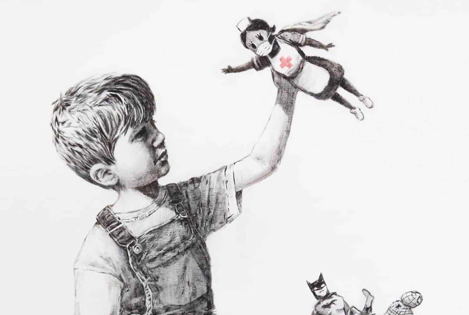A picture shows a drawing created by the street artist Banksy called "Game Changer" as an appreciation for the NHS and is on display at Southampton General Hospital, in Southampton