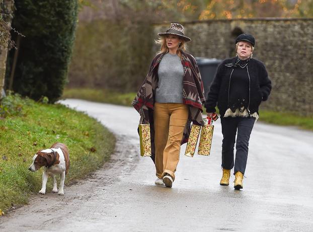 *EXCLUSIVE* Boho Kate Moss delivers festive gifts to neighbours **NO UK PAPERS AND UK PAPER ONLINE SITES**