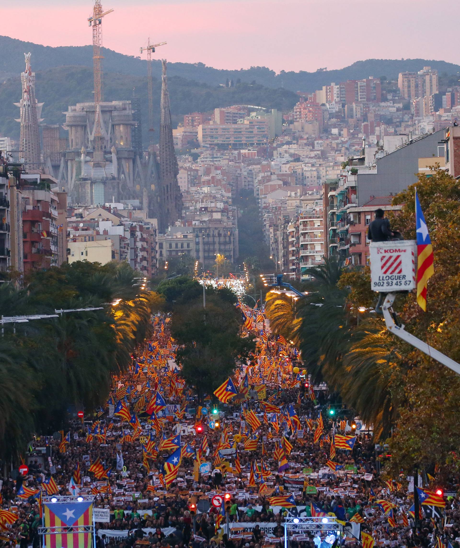 Protesters hold banners and Estelada flags during a demonstration called by pro-independence associations asking for the release of jailed Catalan activists and leaders, in Barcelona