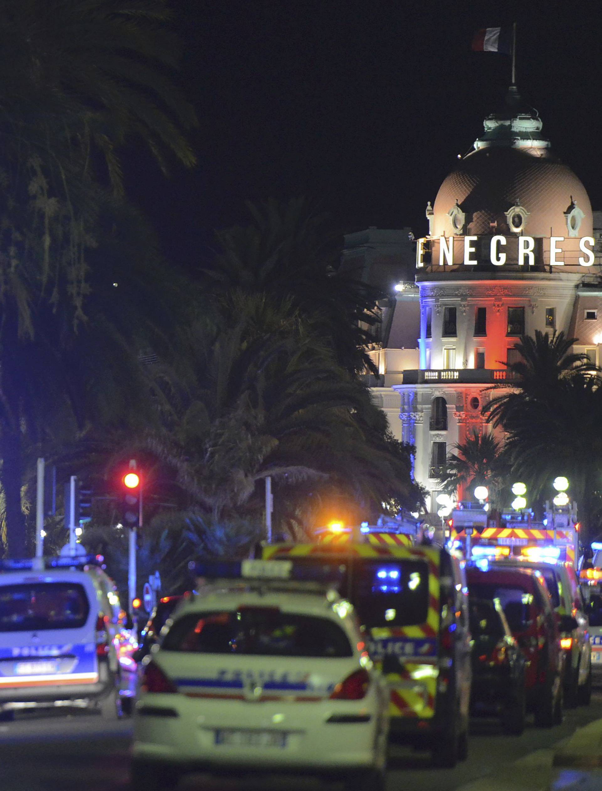 French police and rescue forces vehicles are seen on the Promenade des Anglais after at least 60 people were killed in Nice when a truck ran into a crowd celebrating the Bastille Day national holiday