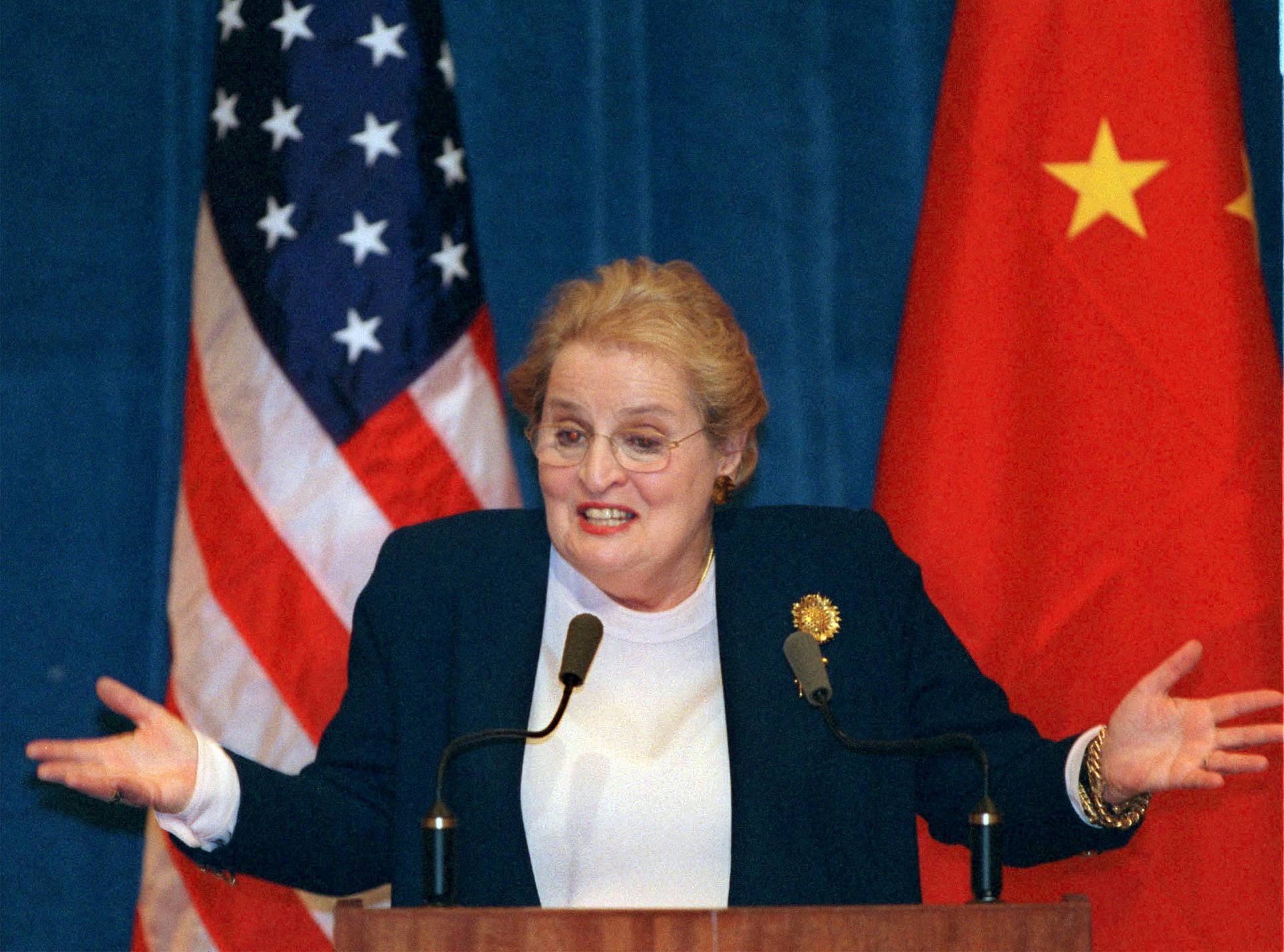 FILE PHOTO: U.S. Secretary of State Madeleine Albright reacts to a journalist's question during a press briefing ..