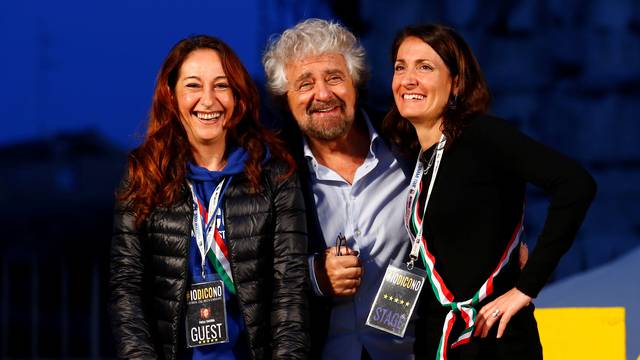 Beppe Grillo, the founder of the anti-establishment 5-Star Movement, is seen with members of the Movement during a march in support of the 'No' vote in the upcoming constitutional reform referendum in Rome