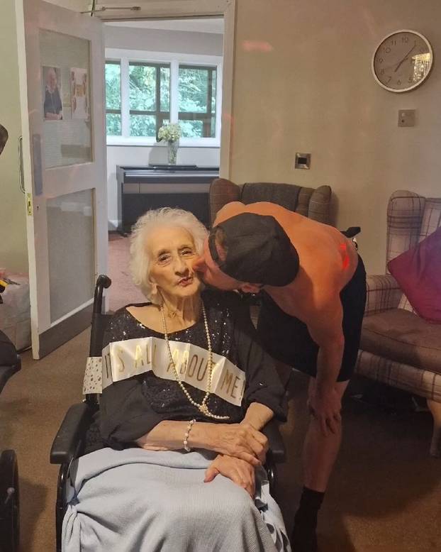 Tea and beef-cake! OAP gets Butler in the Buff for her 103rd birthday at care home