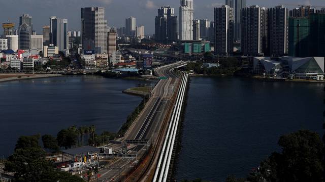 FILE PHOTO: A view of the empty Woodlands Causeway between Singapore and Malaysia after Malaysia imposed a lockdown on travel due to the coronavirus disease (COVID-19) outbreak