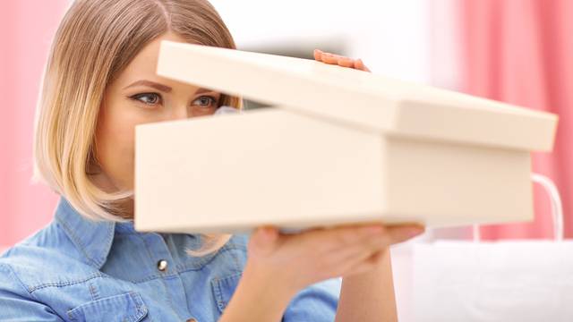 Pleasant,Woman,Opening,Box,With,Shoes