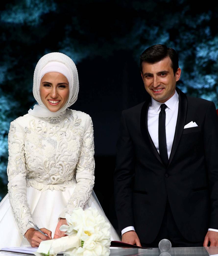 Sumeyye Erdogan, daughter of Turkish President Tayyip Erdogan, and her husband Selcuk Bayraktar are seen during their wedding ceremony in Istanbul, Turkey