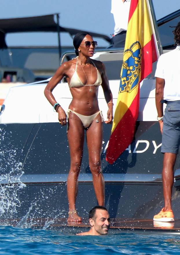 *EXCLUSIVE* *WEB MUST CALL FOR PRICING* - 54-year-old English supermodel Naomi Campbell looks in spectacular shape while celebrating actress Michelle Rodriguez's 46th birthday on a Luxury yacht in Ibiza alongside Mexican actress Eiza Gonzalez and Saudi fi