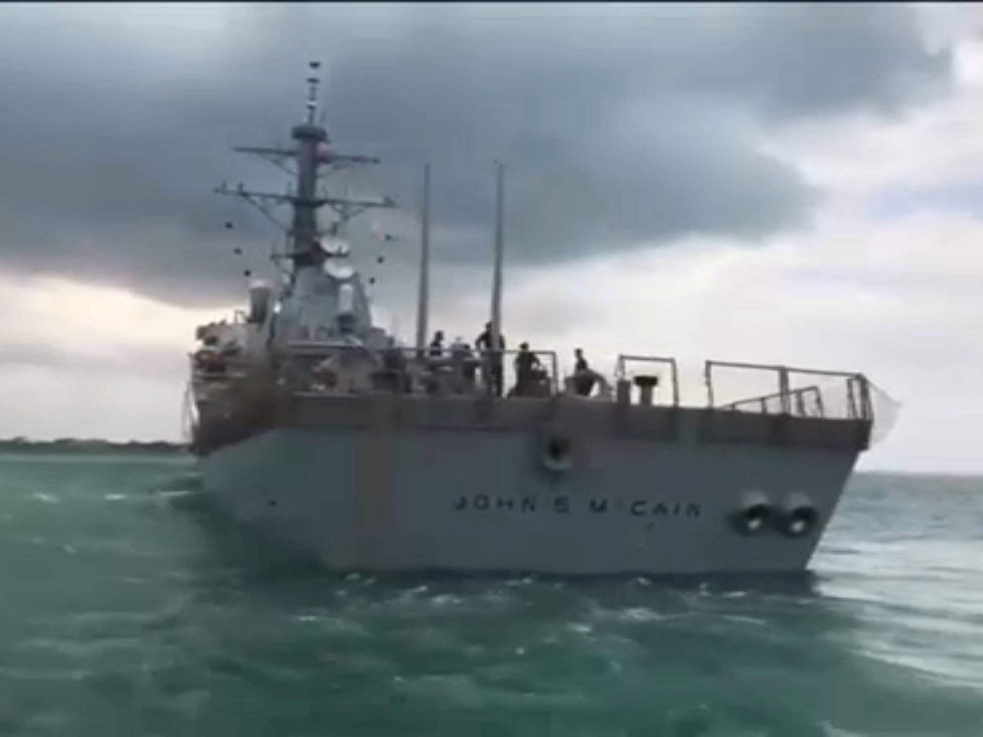 The U.S. Navy guided-missile destroyer USS John S. McCain is seen after a collision, in Singapore waters in this still frame taken from video