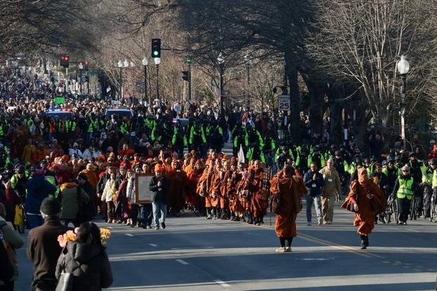 A group of Buddhist monks on the 2,300 mile “Walk for Peace” walk along Massachusetts Avenue at Embassy Row, in Washington