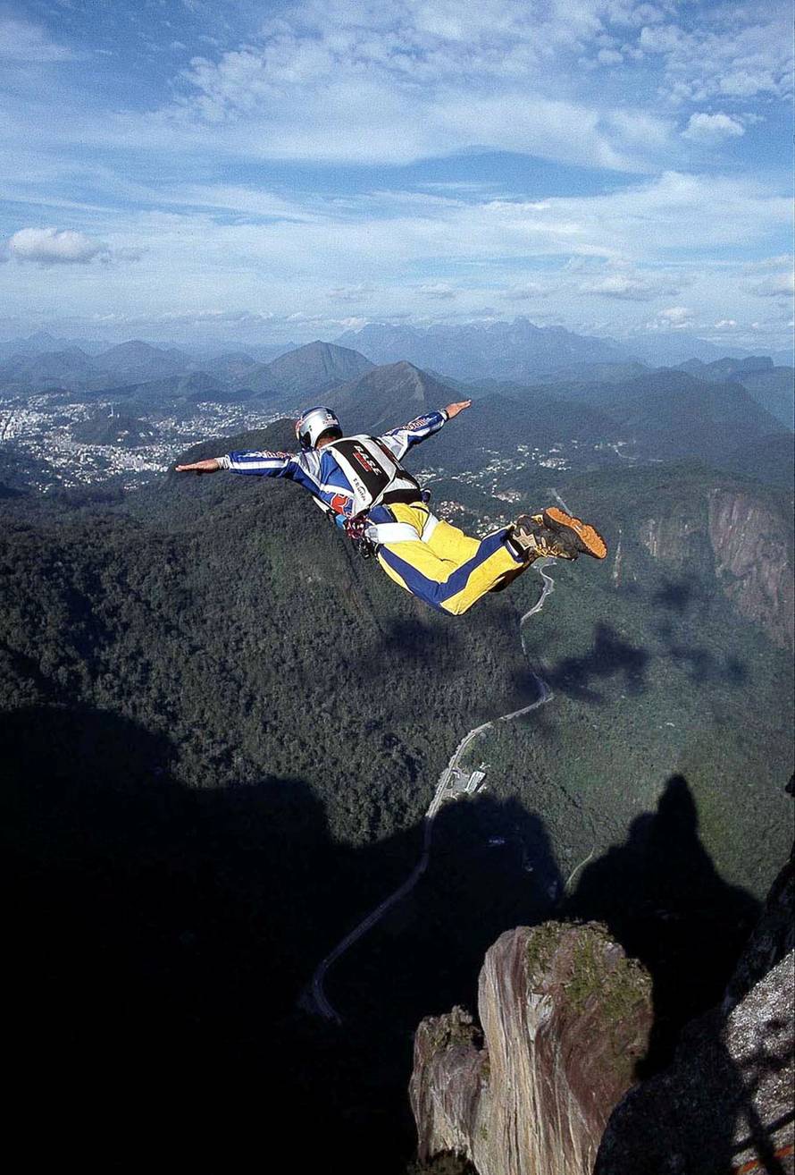 FILE PHOTO: Austrian base-jumper Felix Baumgartner, 32, jumps oFf the "Dedo de Deus" rock