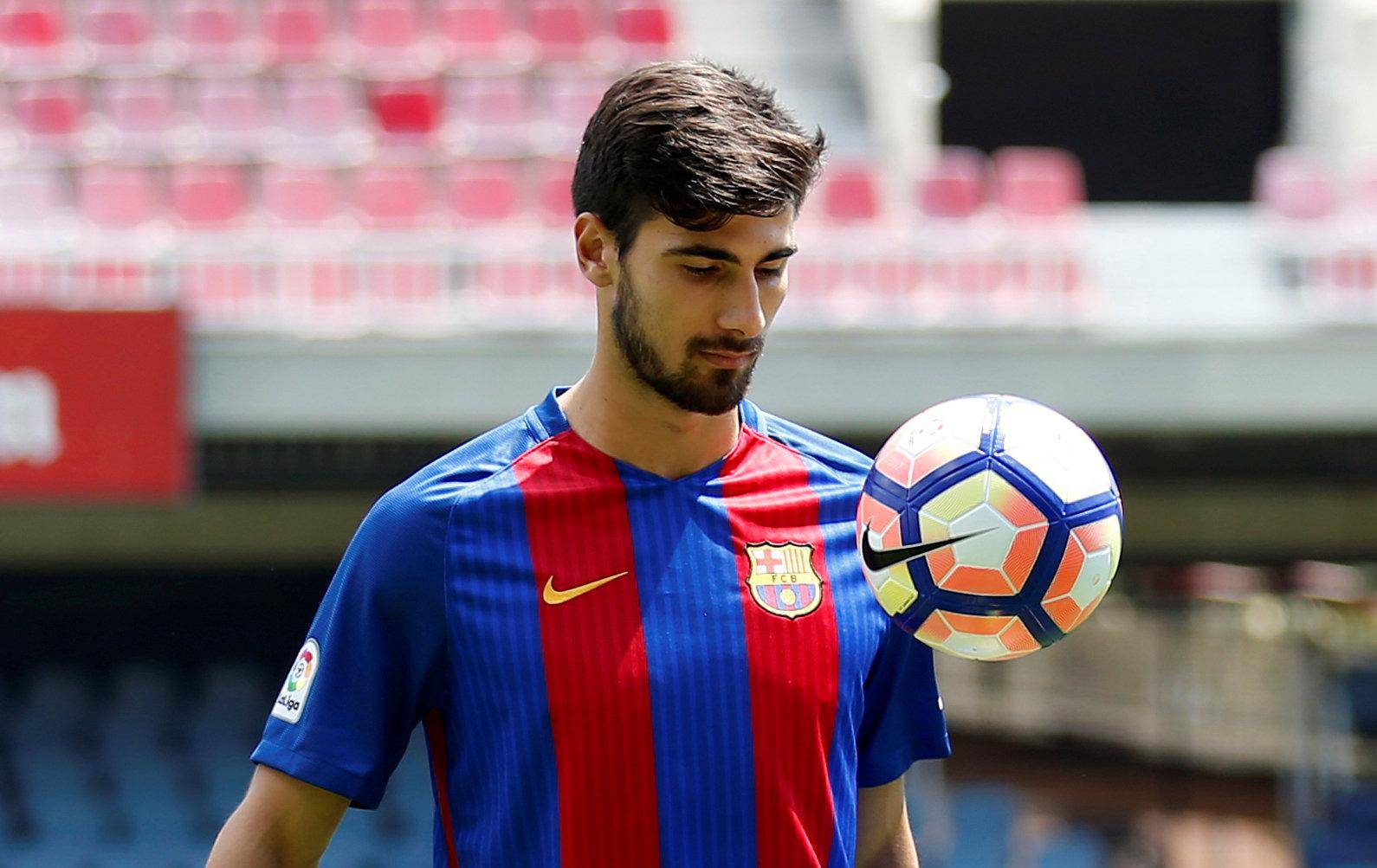 FC Barcelona's newly signed soccer player Andre Gomes plays with a ball during his presentation at Miniestadi stadium in Barcelona