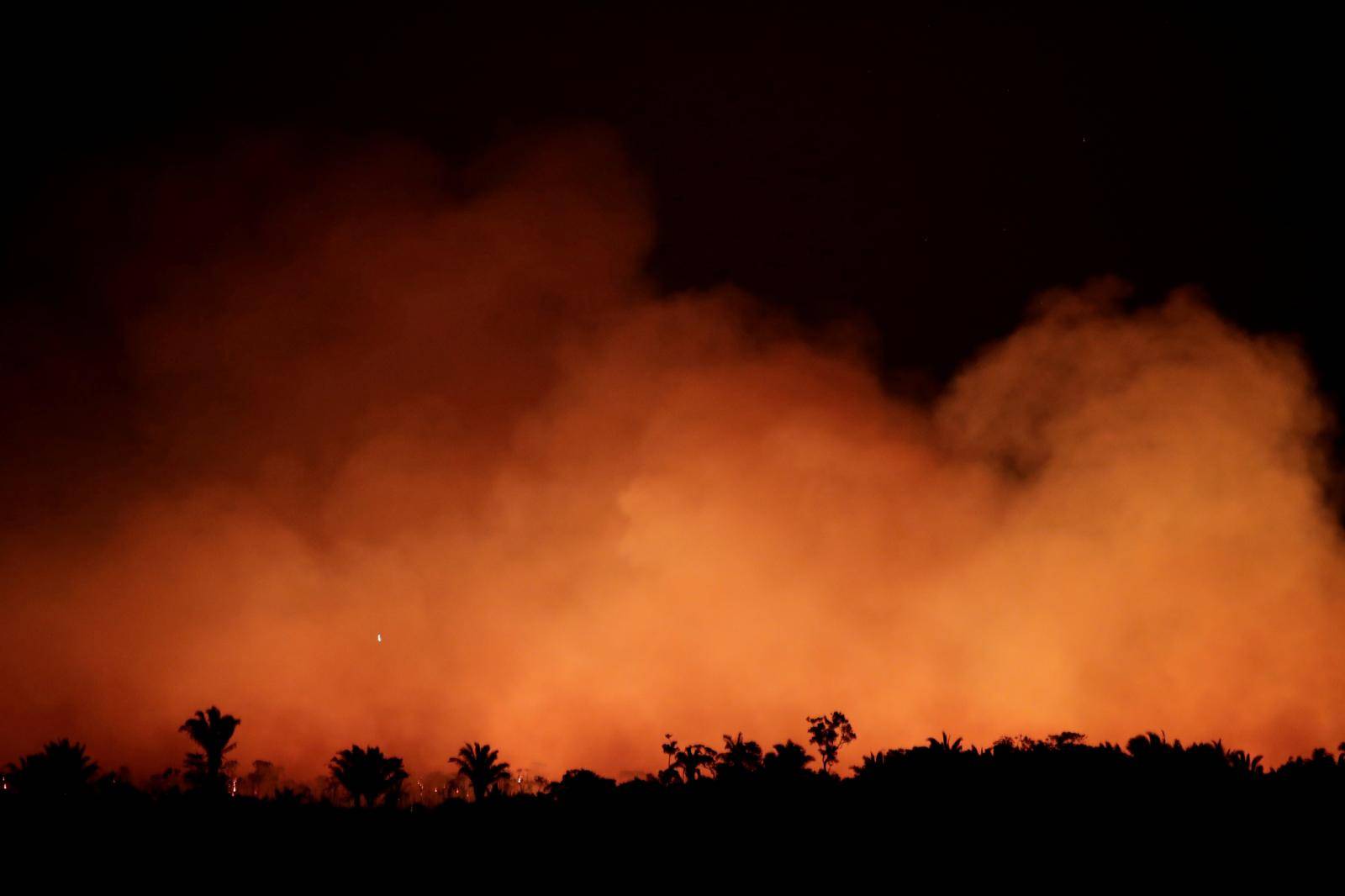 FILE PHOTO: Smoke billows during a fire in an area of the Amazon rainforest near Humaita, Amazonas