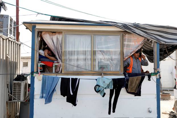 Humanitarian aid is waited to be transferred into Gaza from Israel, at the Gaza part of the Kerem Shalom crossing in the Gaza Strip