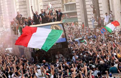 The Italy team drive through Rome on a open top bus tour after they won Euro 2020