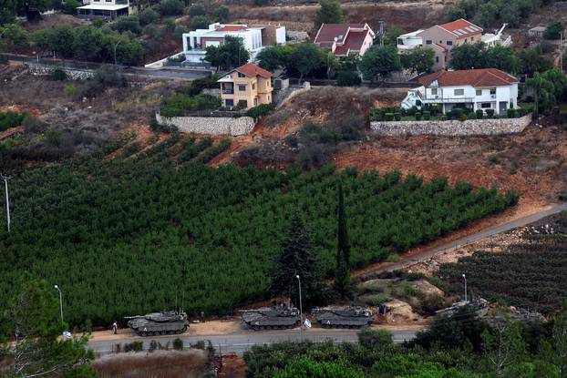 Israeli tanks are seen near Israel's border with Lebanon, as tension mounts between the two countries, in northern Israel