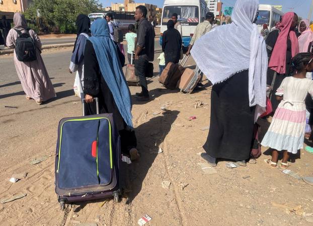 People gather at the station to flee from Khartoum