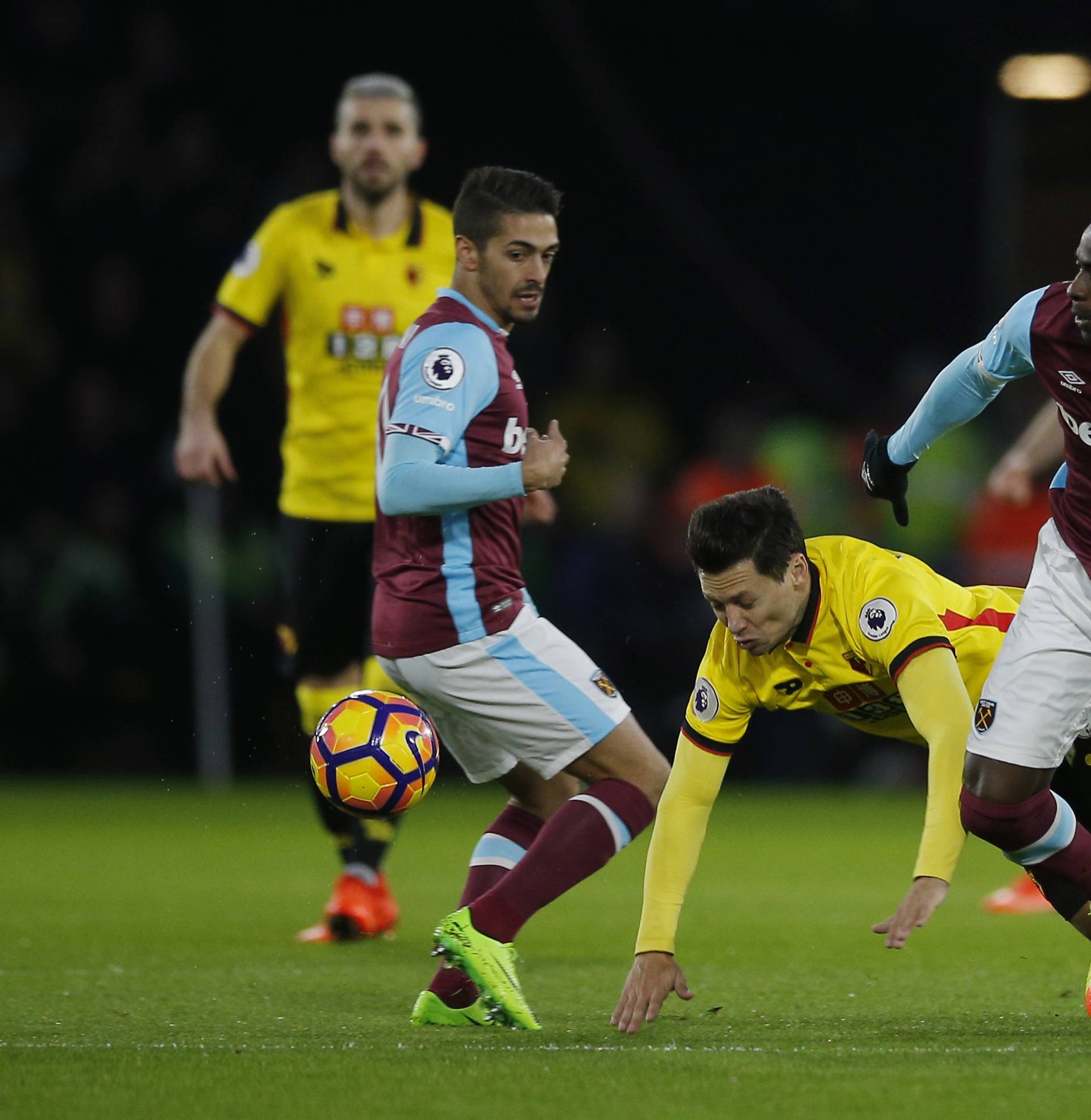 Watford's Mauro Zarate in action with West Ham United's Pedro Obiang