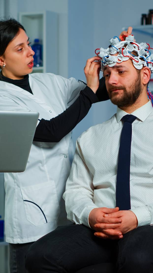 Team neurological researchers working together developing treatment