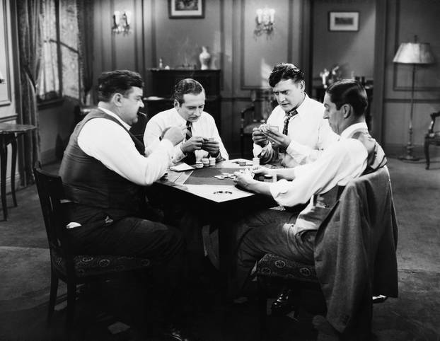 Four,Men,Playing,Cards