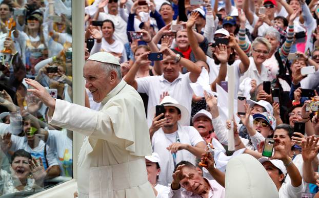 Pope Francis arrives on the popemobile for a holy mass at Enrique Olaya Herrera airport in Medellin