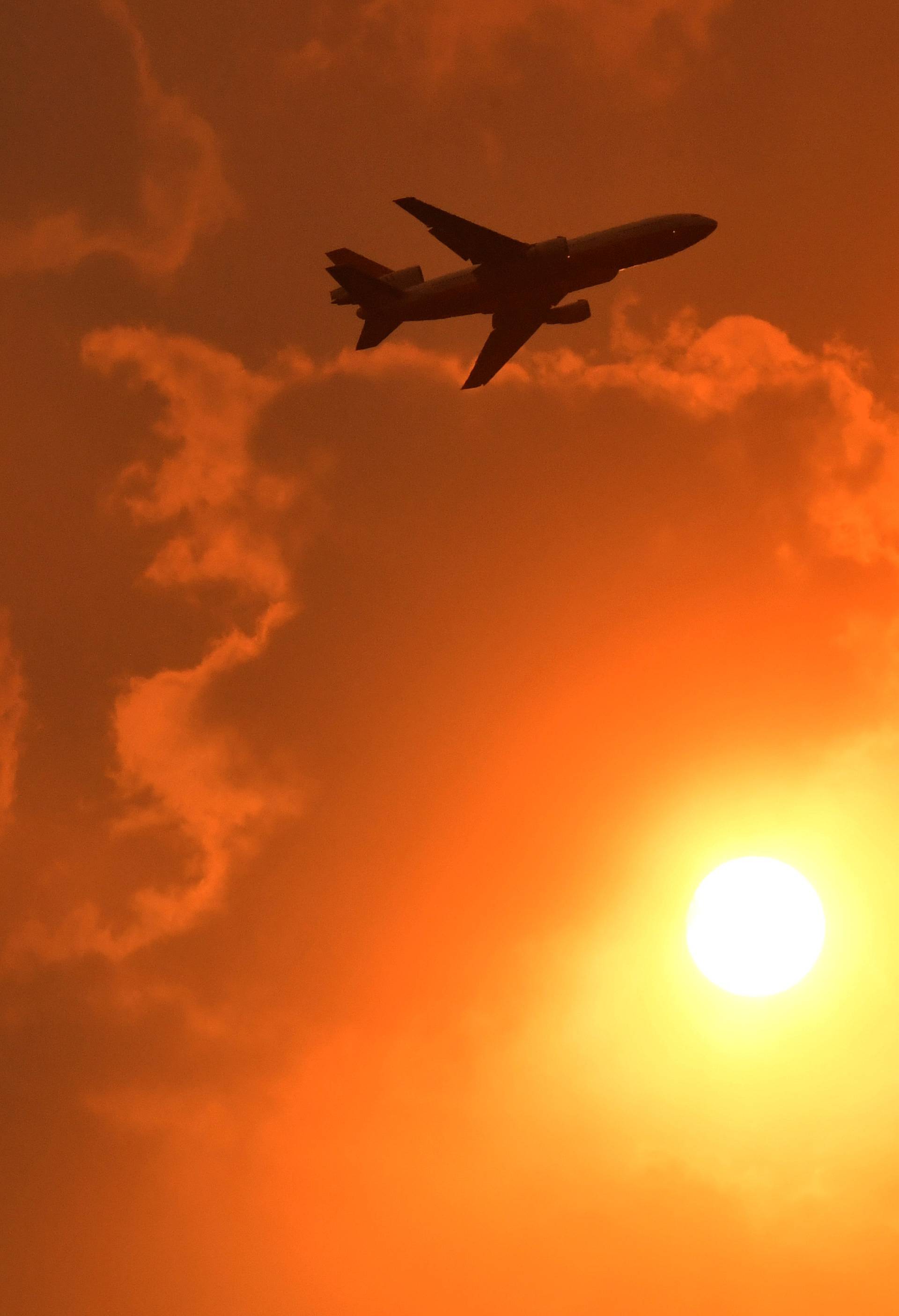 A DC-10 Air Tanker makes a pass to drop fire retardant on a bushfire in North Nowra, south of Sydney