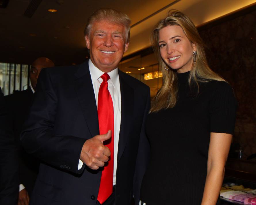 Donald Trump distributes free money at the launch of FundAnything.com at Trump Plaza.