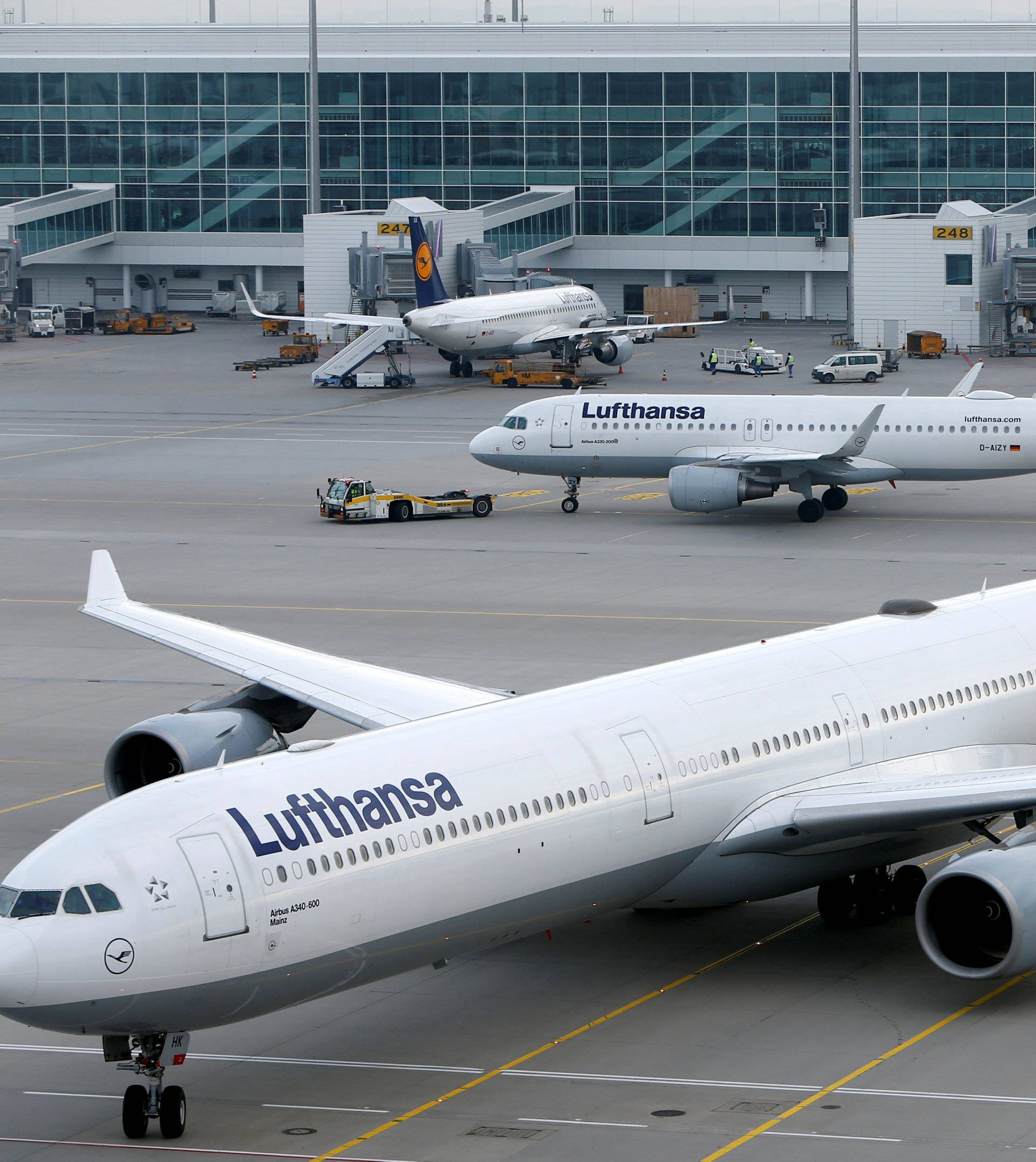 FILE PHOTO: Lufthansa planes arrive at the international airport in Munich