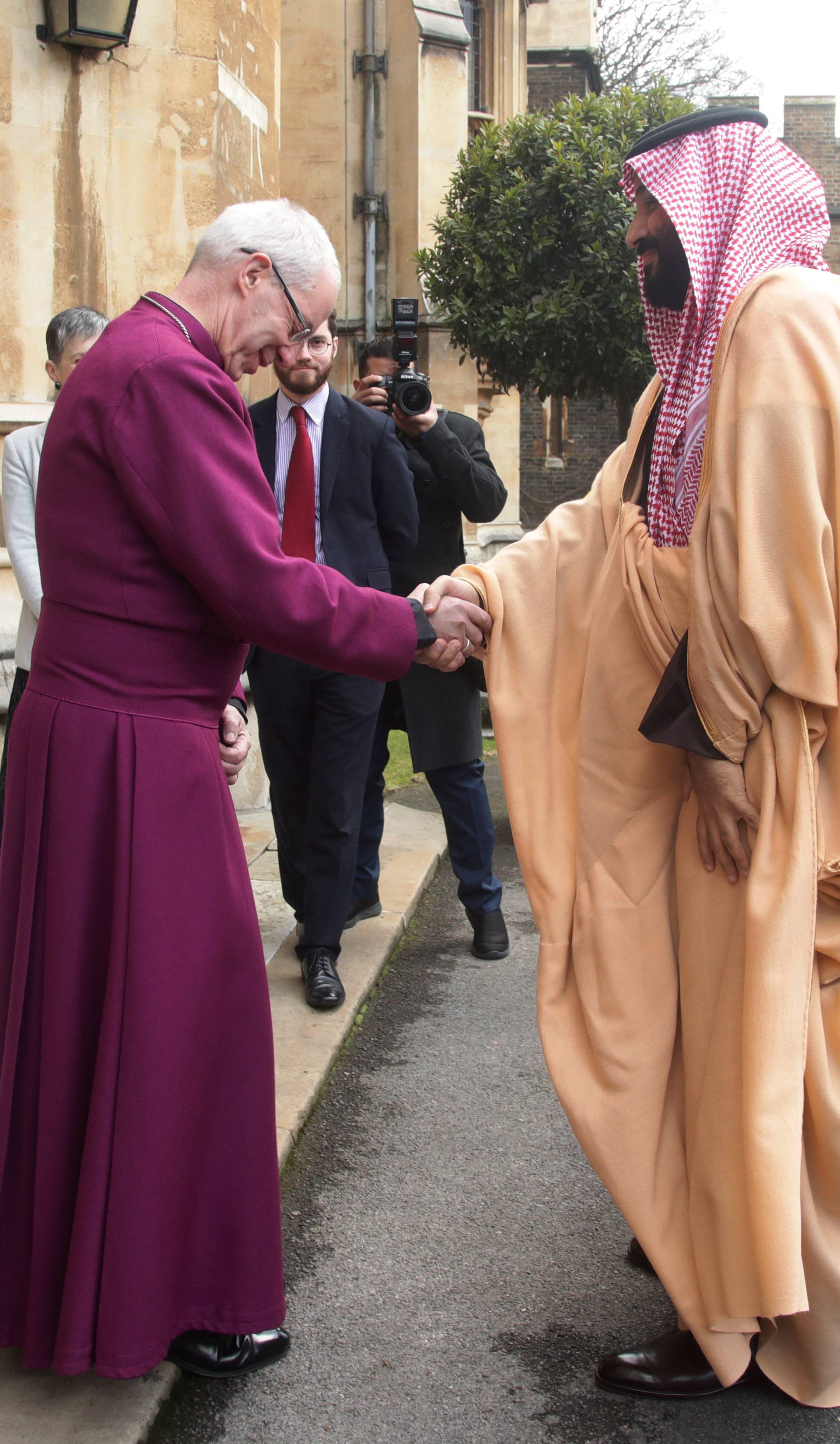 Britain's Archbishop of Canterbury Justin Welby greets the Crown Prince of Saudi Arabia Mohammed bin Salman as he arrives at Lambeth Palace, London