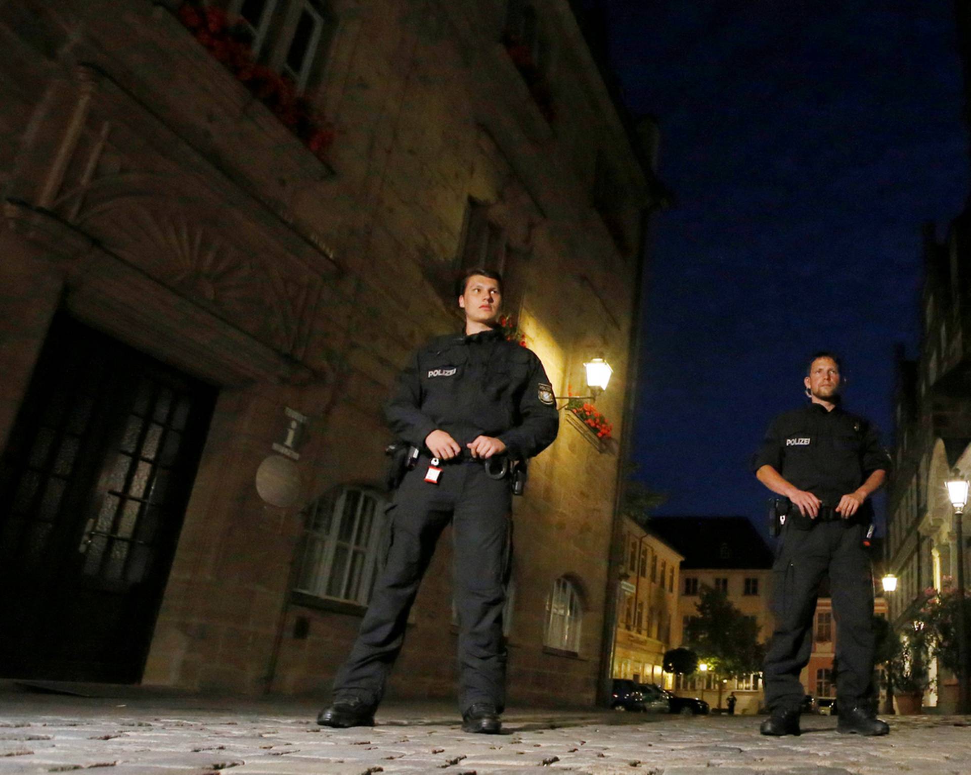 Police secure an area after an explosion in Ansbach, near Nuremberg