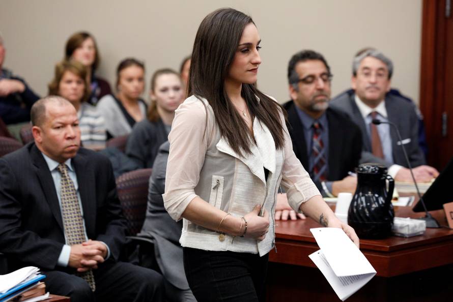 Victim and former gymnast Jordyn Wieber walks to the podium to speak at the sentencing hearing for Larry Nassar, a former team USA Gymnastics doctor who pleaded guilty in November 2017 to sexual assault charges, in Lansing