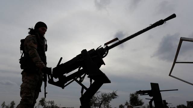 Turkey-backed Free Syrian Army fighters are seen at a training camp in Azaz