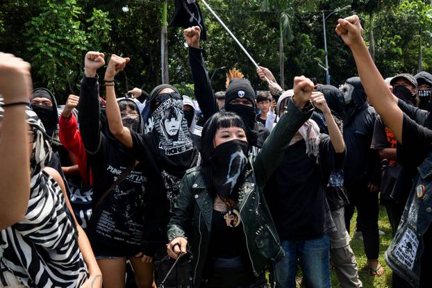 Filipinos gather during a protest denouncing what they call corruption linked to flood control projects