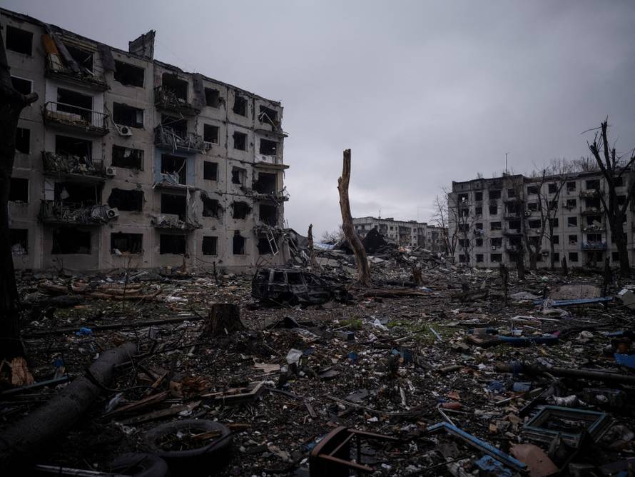 Debris lay on a backyard of apartment buildings damaged by Russian military strikes in the frontline town of Kostiantynivka