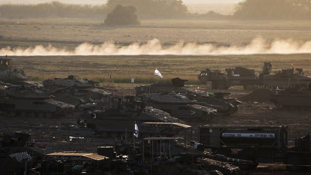 Israeli tanks and other military at Israel's border with the Gaza Strip, in southern Israel