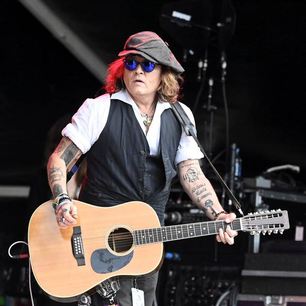 Actor Johnny Depp performs with musician Jeff Beck, in Helsinki