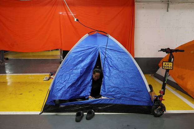 Israelis hold a Passover Seder in an underground parking garage used as a public bomb shelter, in Tel Aviv